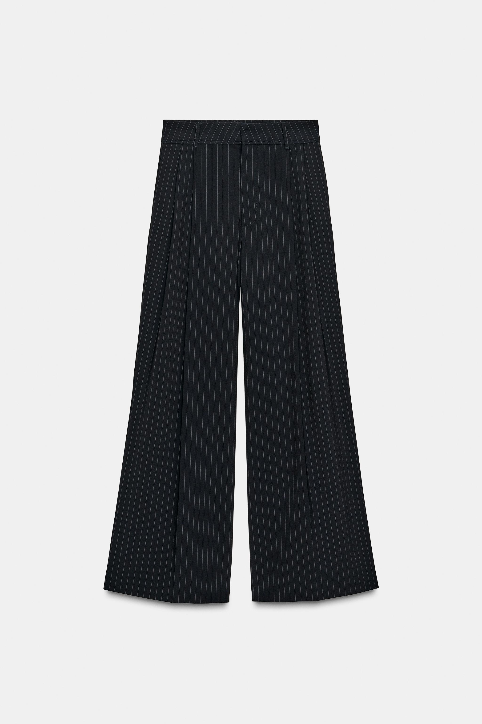 PINSTRIPE PANTS WITH PLEATS AND FLAPS